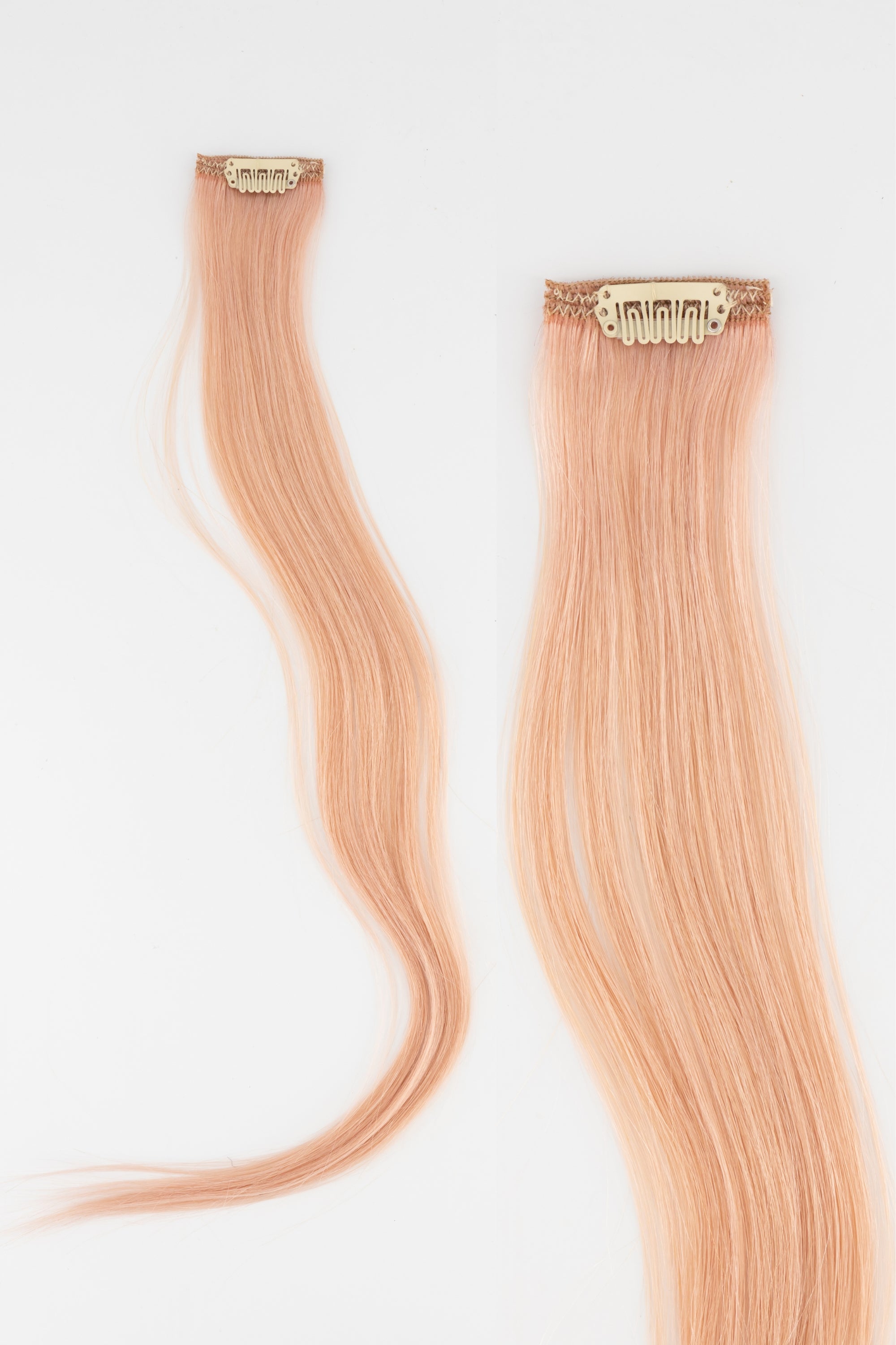 Frontrow human hair clip-in colour strips in pastel pink