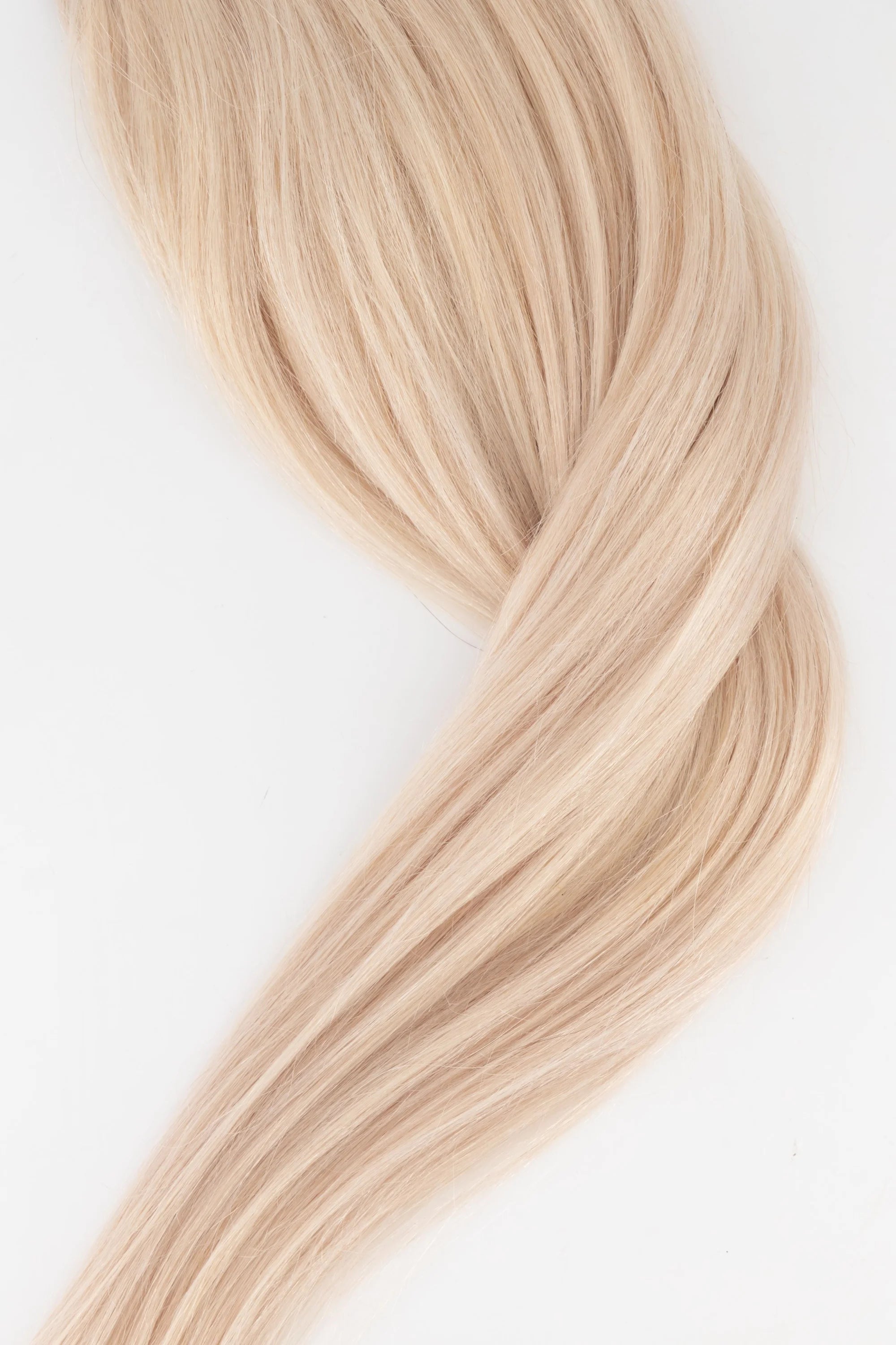 Frontrow clip-in ponytail extensions in ash blonde