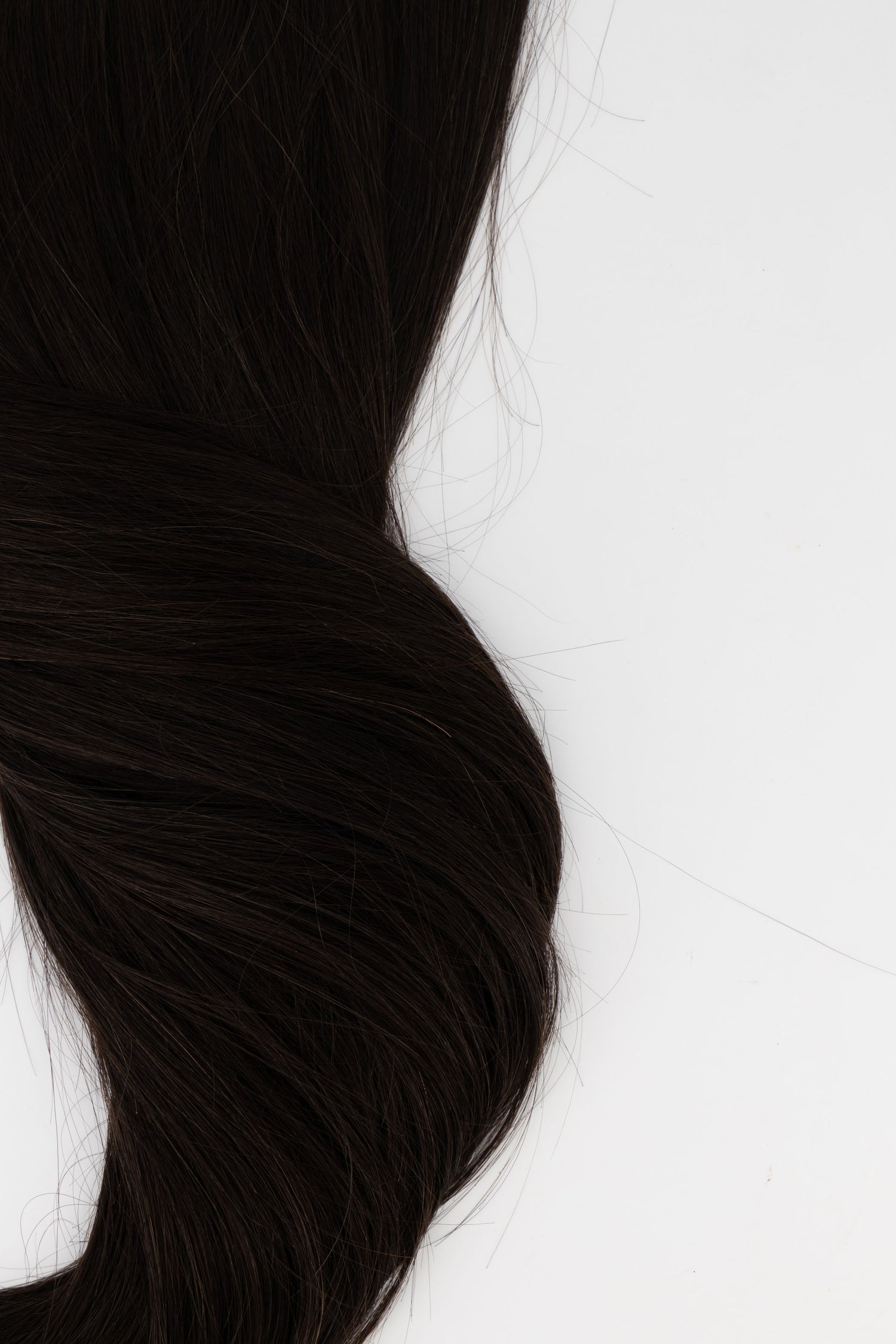 Frontrow clip-in hair extensions in brown black