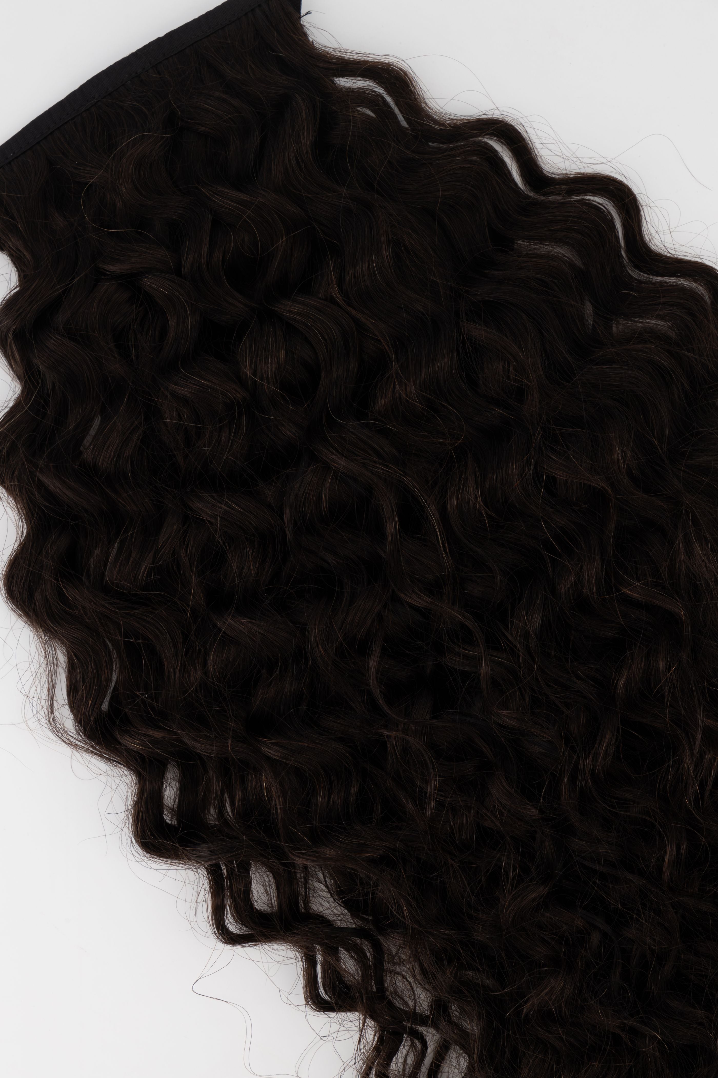 Frontrow curly clip-in ponytail extensions in brown black