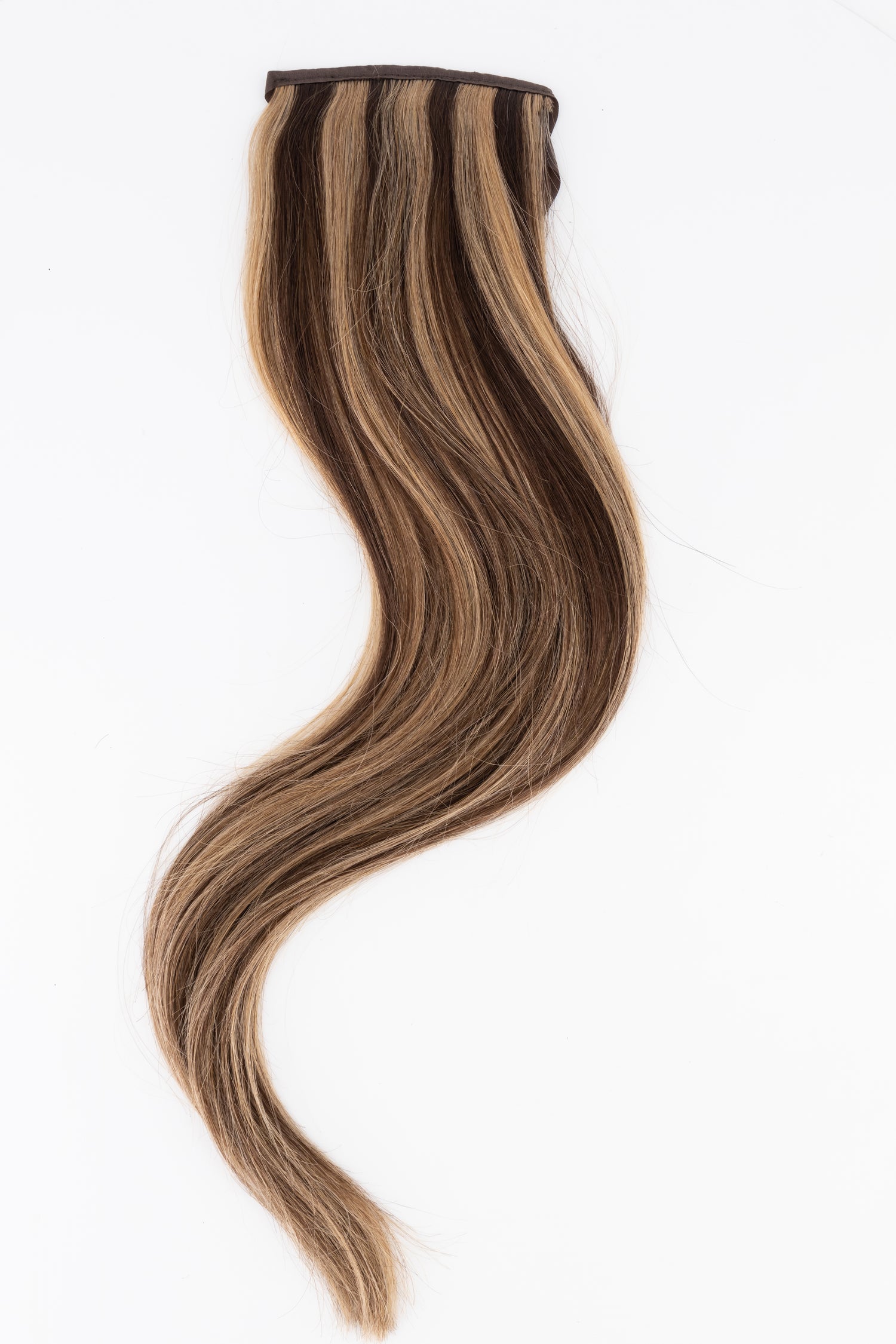 Frontrow clip-in ponytail extensions in highlighted brown