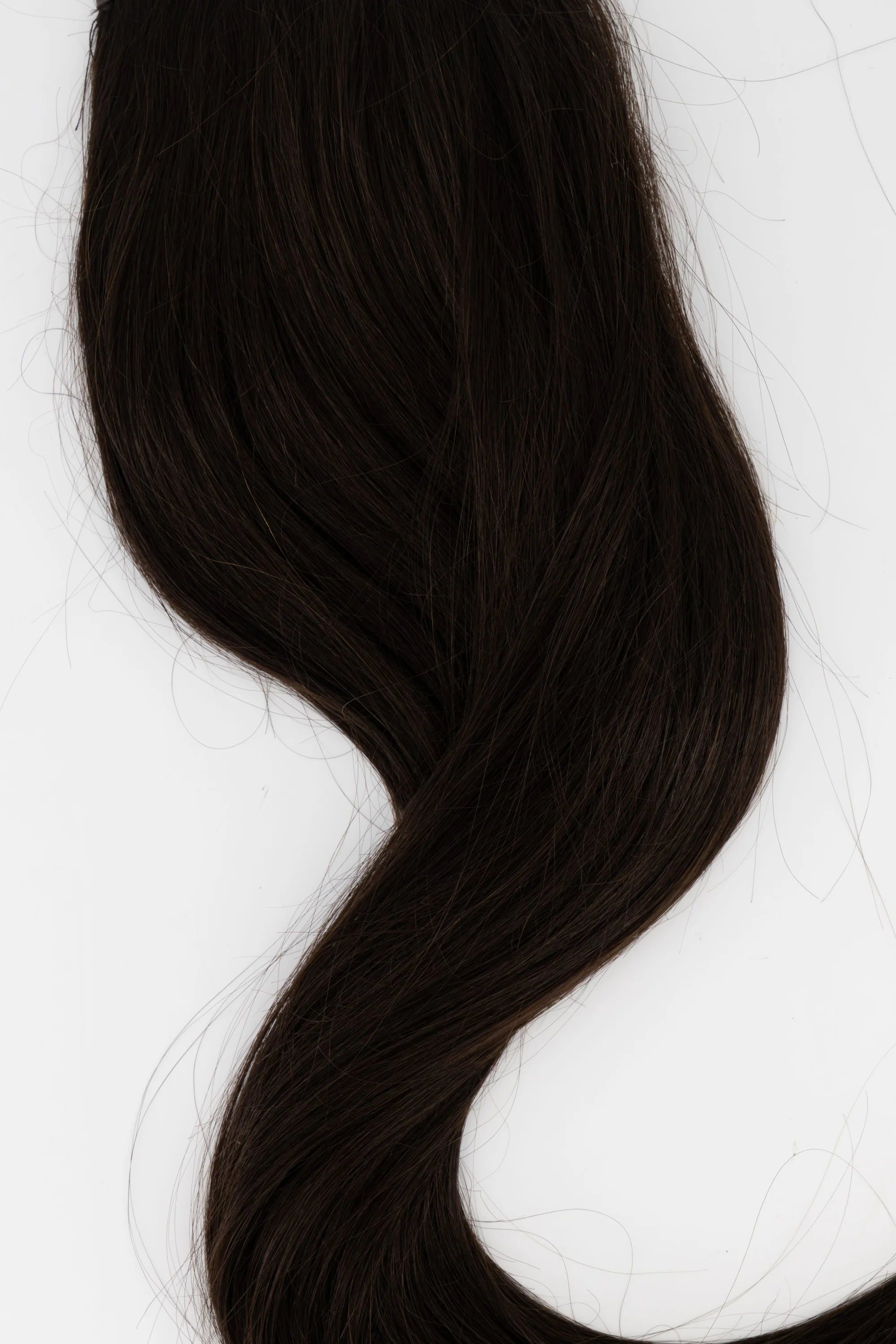 Frontrow clip-in ponytail extensions in brown black