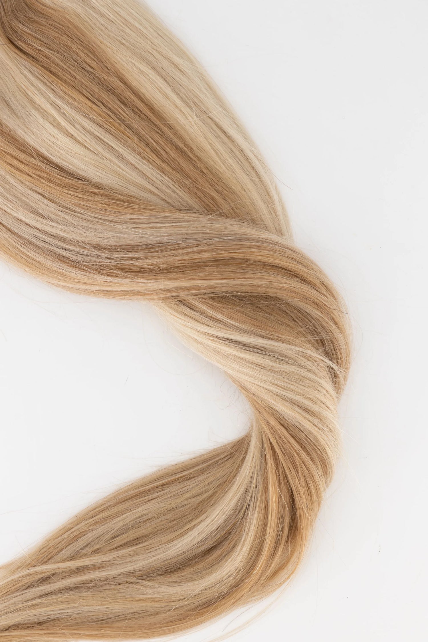 Frontrow clip-in ponytail extensions in mixed blonde
