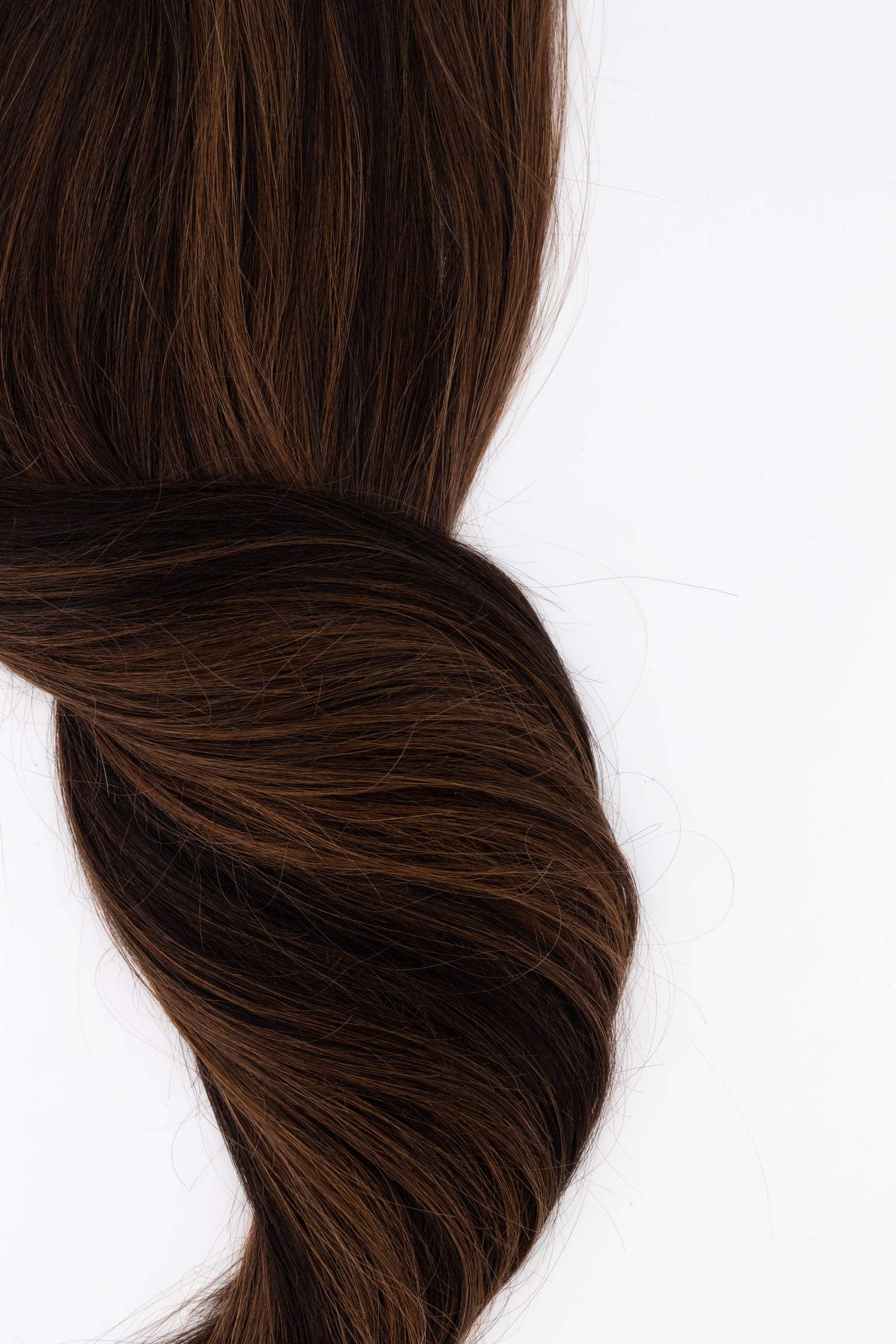 Frontrow clip-in ponytail extensions in mixed chocolate