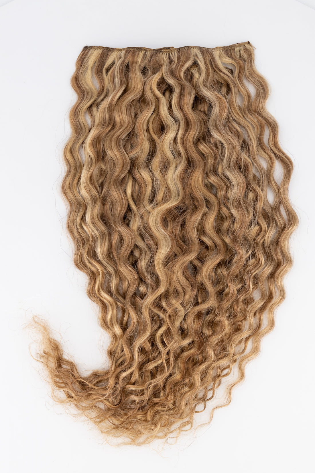 Frontrow curly clip-in hair extensions in mixed toffee blonde