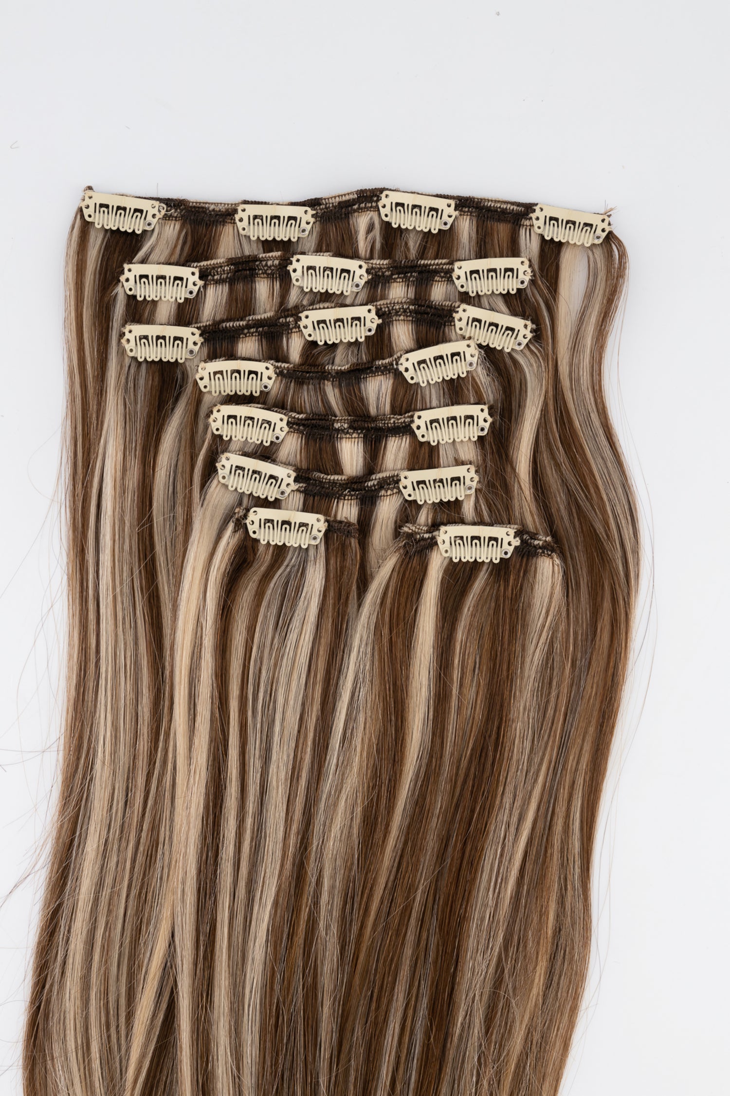 Frontrow clip-in hair extensions in ash brown