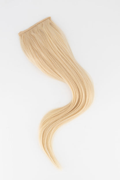 Frontrow clip-in ponytail extensions in light blonde