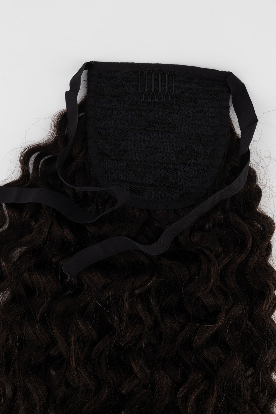 Frontrow curly clip-in ponytail extensions in brown black