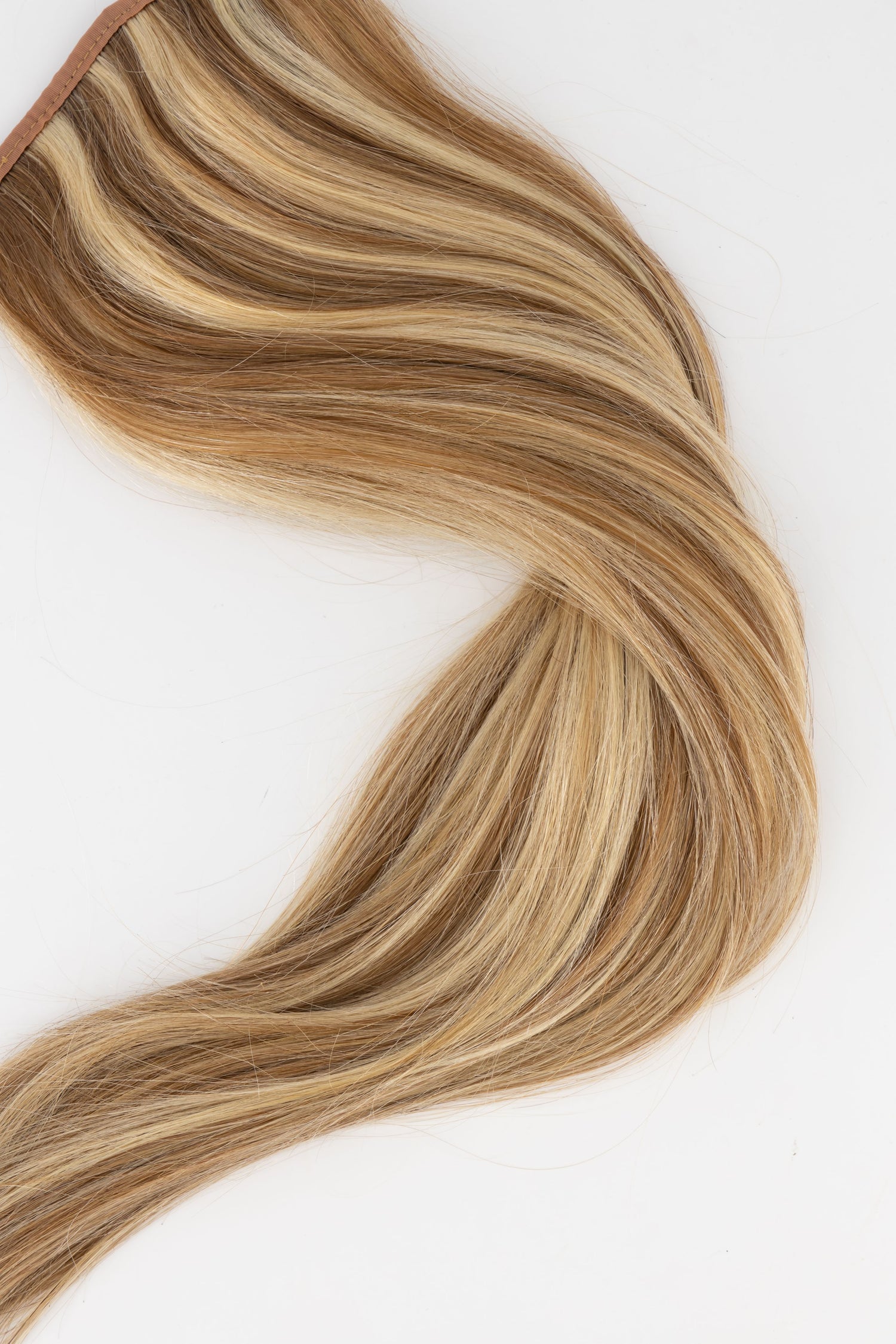 Frontrow clip-in ponytail extensions in mixed blonde