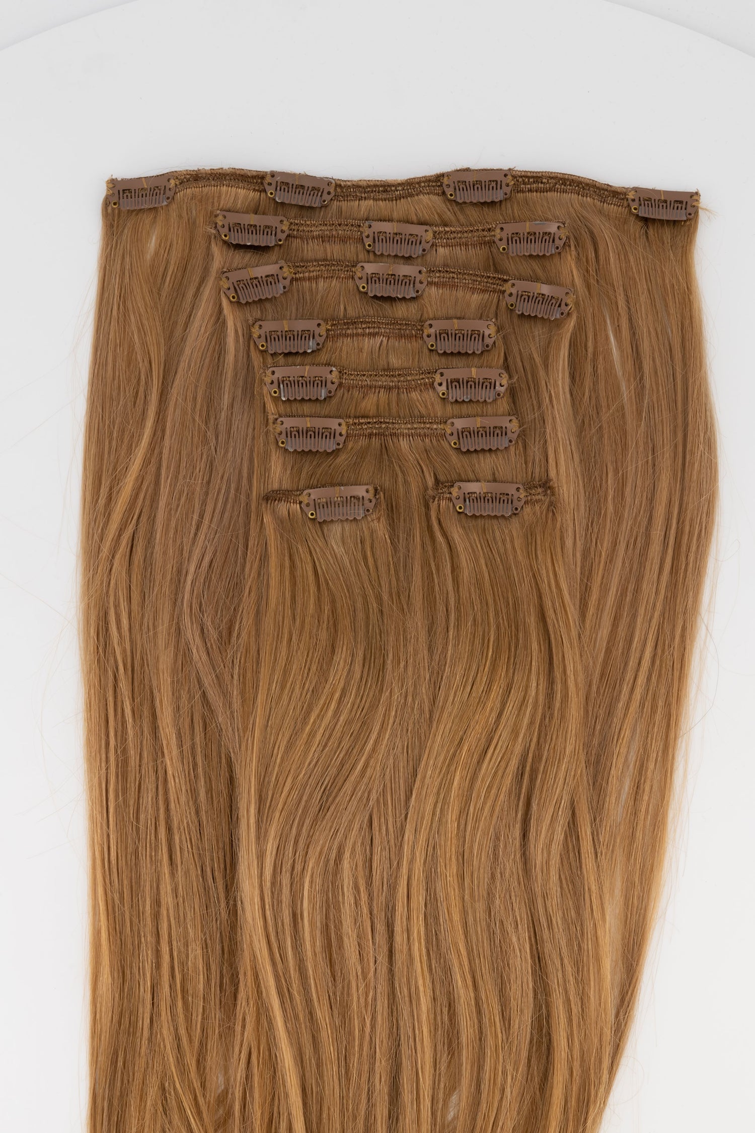 Frontrow clip-in hair extensions in toffee blonde