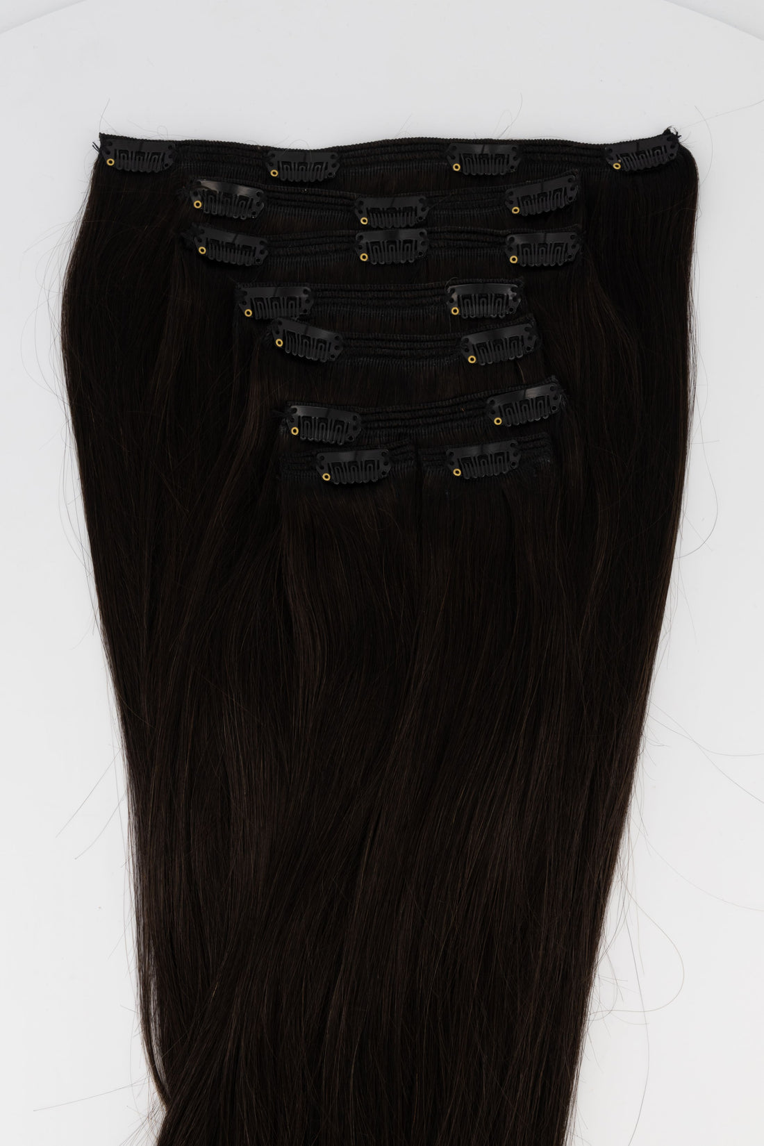 Frontrow clip-in hair extensions in brown black