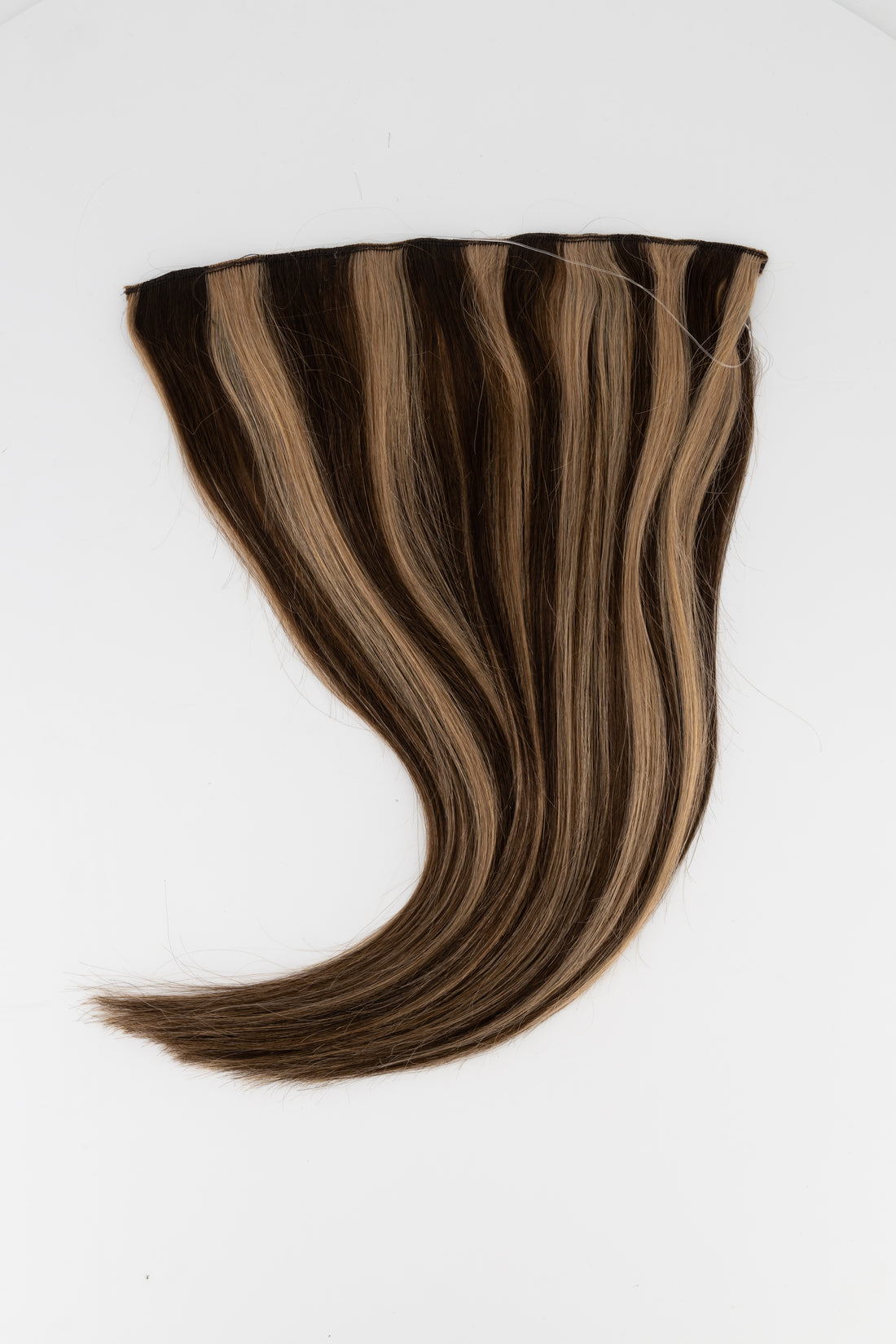 Frontrow halo hair extensions in highlighted brown