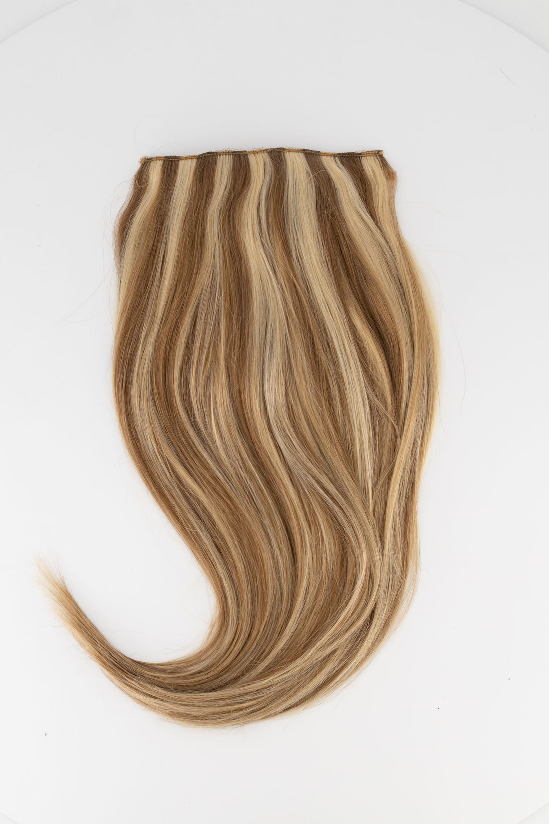 Frontrow clip-in hair extensions in mixed toffee blonde